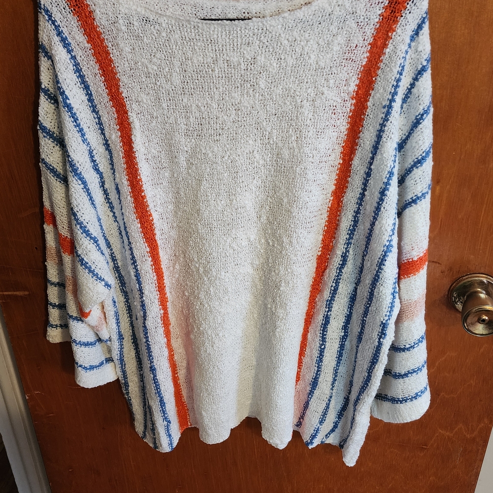 Striped White Sweater with Blue and Orange Accents
